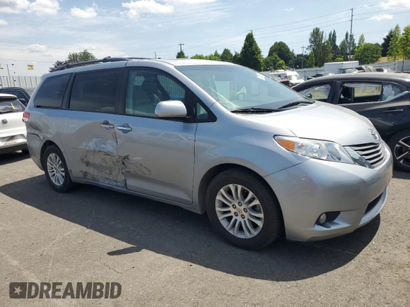 2012 Toyota Sienna XLE AAS with VIN 5TDYK3DC0CS194193, listed as a Copart auction lot 60265455 with 139,246 mi miles and Salvage title. Bid and sale history available at DreamBid. Image 4.