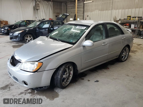 2006 Kia Spectra EX with VIN KNAFE121565357402, listed as a Copart auction lot 72889614 with 200,657 mi miles and Salvage Title. Bid and sale history available at carsss.com. Image 1.