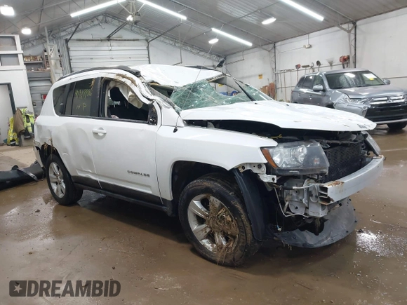 2014 Jeep Compass Sport with VIN 1C4NJDBB3ED773960, listed as a IAAI auction lot 41989986 with 126,875 mi miles. Bid and sale history available at carsss.com. Image 1.