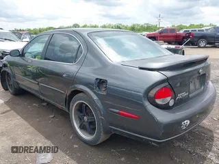 2001 Nissan Maxima GLE z VIN JN1CA31A31T112426, wystawiony jako IAAI lot #42248865 z przebiegiem Nie podano mil oraz . Historia ofert i sprzedaży dostępna na DreamBid. Obrazek 3.