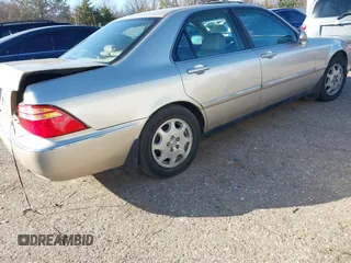 2000 Acura RL w/Navigation System with VIN JH4KA9668YC004134, listed as a IAAI auction lot 41475780 with 212,473 mi miles. Bid and sale history available at carsss.com. Image 4.