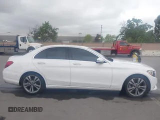 2018 Mercedes-Benz C 300 with VIN 55SWF4JB9JU235630, listed as a IAAI auction lot 42063801 with 117,855 mi miles and . Bid and sale history available at DreamBid. Image 13.