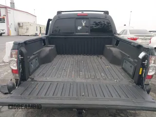 2009 Toyota Tacoma PreRunner with VIN 3TMJU62N99M076105, listed as a IAAI auction lot 42709523 with 206,948 mi miles and . Bid and sale history available at DreamBid. Image 18.