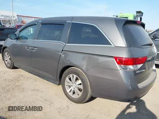 2015 Honda Odyssey EX-L with VIN 5FNRL5H67FB130663, listed as a IAAI auction lot 41988034 with 180,254 mi miles and . Bid and sale history available at carsss.com. Image 3.