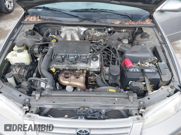 1998 Toyota Camry LE z VIN 4T1BF22K2WU042166, wystawiony jako IAAI lot #42416930 z przebiegiem 124 809 mil mil oraz . Historia ofert i sprzedaży dostępna na DreamBid. Obrazek 10.