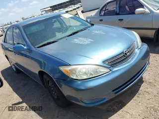 2003 Toyota Camry LE with VIN 4T1BE32KX3U682520, listed as a IAAI auction lot 42056194 with 116,969 mi miles and . Bid and sale history available at DreamBid. Image 1.