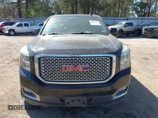 2015 GMC Yukon SLT z VIN 1GKS1BKC8FR112952, wystawiony jako IAAI lot #41836398 z przebiegiem 155 329 mil mil oraz . Historia ofert i sprzedaży dostępna na DreamBid. Obrazek 12.
