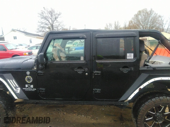 2007 Jeep Wrangler Unlimited X with VIN 1J4GA39177L147346, listed as a IAAI auction lot 41825501 with 163,027 mi miles and . Bid and sale history available at DreamBid. Image 14.