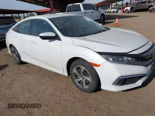 2019 Honda Civic Sedan LX with VIN 2HGFC2F62KH573149, listed as a IAAI auction lot 41575660 with 104,139 mi miles. Bid and sale history available at carsss.com. Image 1.