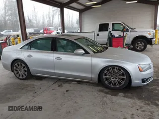 2013 Audi A8 4.0L с VIN WAUA2AFD5DN017770, выставлен на аукционе IAAI как лот 41255625 с пробегом 115 993 миль миль и . История ставок и продаж доступна на DreamBid. Изображение 13.