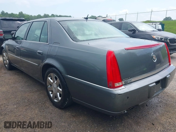 2006 Cadillac DTS 1SC z VIN 1G6KD57Y76U244707, wystawiony jako IAAI lot #42445115 z przebiegiem 189 119 mil mil oraz . Historia ofert i sprzedaży dostępna na DreamBid. Obrazek 3.