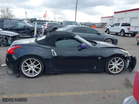 2010 Nissan 370Z Touring with VIN JN1AZ4FH3AM302412, listed as a IAAI auction lot 41290785 with 112,330 mi miles. Bid and sale history available at carsss.com. Image 13.