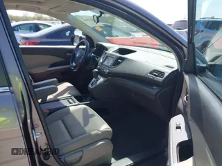 2014 Honda CR-V EX-L with VIN 5J6RM4H70EL096555, listed as a IAAI auction lot 42038062 with 113,601 mi miles. Bid and sale history available at carsss.com. Image 5.