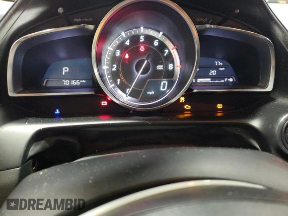 2017 Mazda CX-3 Grand Touring z VIN JM1DKFD70H0148182, wystawiony jako Copart lot #59032435 z przebiegiem 70 166 mil mil oraz Szkoda całkowita • Salvage title. Historia ofert i sprzedaży dostępna na DreamBid. Obrazek 9.