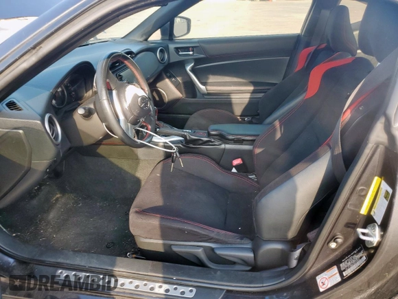 2016 Scion FR-S z VIN JF1ZNAA1XG8709638, wystawiony jako Copart lot #59103905 z przebiegiem 51 987 mil mil oraz Szkoda całkowita • Salvage title. Historia ofert i sprzedaży dostępna na DreamBid. Obrazek 7.
