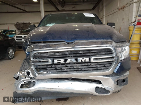 2019 Ram 1500 Big Horn z VIN 1C6SRFFT5KN762580, wystawiony jako IAAI lot #41858654 z przebiegiem 57 801 mil mil oraz . Historia ofert i sprzedaży dostępna na DreamBid. Obrazek 12.