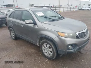 2011 Kia Sorento LX with VIN 5XYKT4A12BG180674, listed as a IAAI auction lot 42147562 with 255,809 mi miles. Bid and sale history available at carsss.com. Image 1.