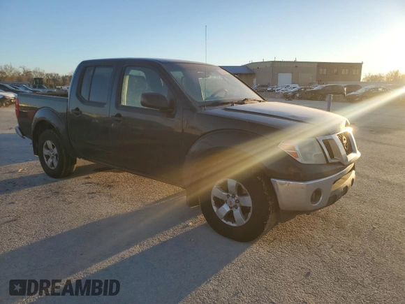2010 Nissan Frontier SE with VIN 1N6AD0EV6AC404172, listed as a Copart auction lot 83233344 with 301,326 mi miles and Salvage title. Bid and sale history available at DreamBid. Image 4.