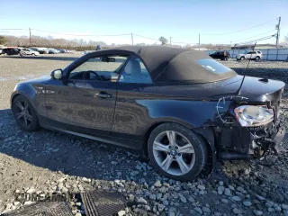 2011 BMW 1 Series 128i with VIN WBAUN1C51BVH82671, listed as a Copart auction lot 43661475 with 115,129 mi miles and Salvage Title. Bid and sale history available at carsss.com. Image 2.