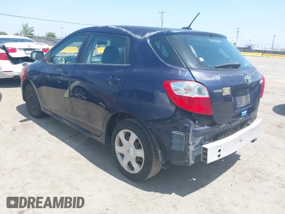 2009 Toyota Matrix with VIN 2T1KU40E99C119135, listed as a IAAI auction lot 42136716 with 185,155 mi miles. Bid and sale history available at carsss.com. Image 3.