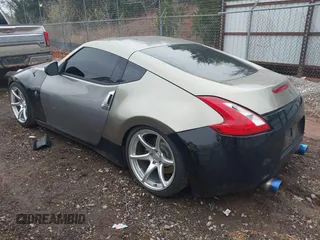 2009 Nissan 370Z Touring with VIN JN1AZ44E69M404341, listed as a IAAI auction lot 41907551 with 144,612 mi miles and . Bid and sale history available at DreamBid. Image 3.