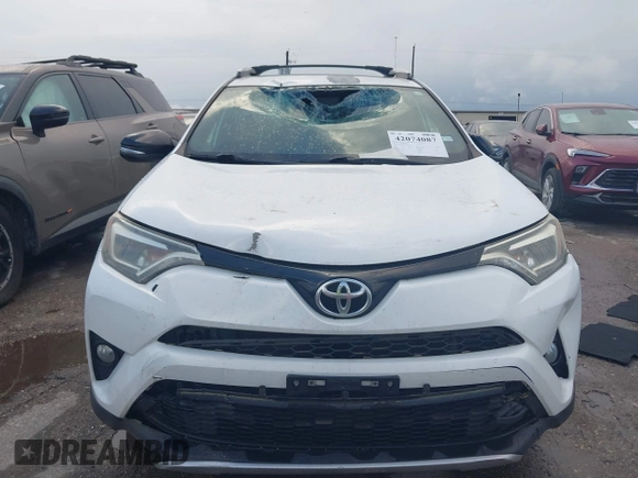 2016 Toyota RAV4 SE with VIN 2T3NFREV6GW262348, listed as a IAAI auction lot 42074087 with 114,791 mi miles and . Bid and sale history available at DreamBid. Image 6.