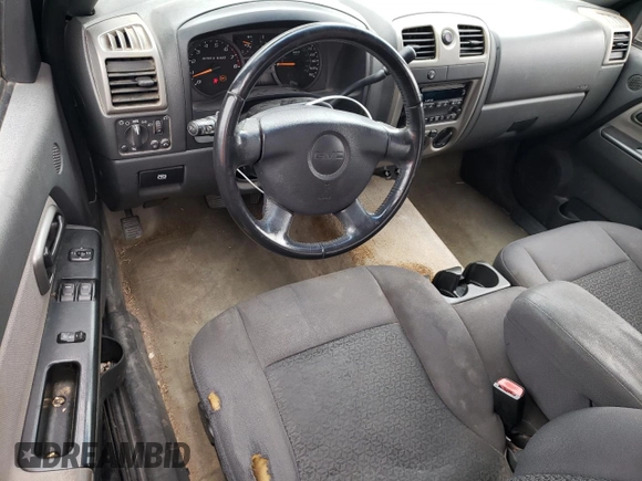 2005 GMC Canyon SLE Z71 with VIN 1GTDS196X58242957, listed as a Copart auction lot 87728635 with 206,977 mi miles and Salvage Title. Bid and sale history available at carsss.com. Image 8.