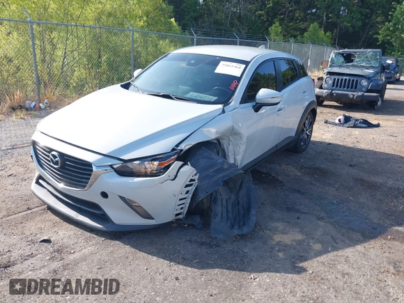 2018 Mazda CX-3 Touring with VIN JM1DKDC73J0319938, listed as a IAAI auction lot 39861564 with 117,199 mi miles. Bid and sale history available at carsss.com. Image 17.