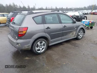 2005 Pontiac Vibe with VIN 5Y2SL63835Z450006, listed as a IAAI auction lot 41876196 with 299,999 mi miles. Bid and sale history available at carsss.com. Image 4.