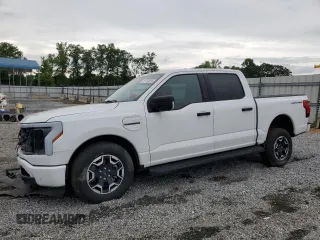 2023 Ford F-150 Lightning Pro z VIN 1FTVW1ELXPWG63466, wystawiony jako Copart lot #59163895 z przebiegiem Nie podano mil oraz Szkody całkowita. Historia ofert i sprzedaży dostępna na DreamBid. Obrazek 1.