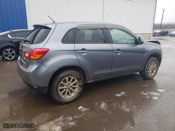2015 Mitsubishi RVR SE with VIN 4A4AJ3AU7FE605996, listed as a Copart auction lot 80292544 with 219,514 mi miles and Salvage Title. Bid and sale history available at carsss.com. Image 3.