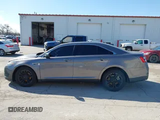 2013 Ford Taurus SEL z VIN 1FAHP2H83DG231000, wystawiony jako IAAI lot #41986420 z przebiegiem 200 390 mil mil oraz . Historia ofert i sprzedaży dostępna na DreamBid. Obrazek 14.