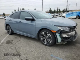 2021 Honda Civic Sport with VIN SHHFK7H4XMU422397, listed as a Copart auction lot 50767515 with 87,010 mi miles and Salvage Title. Bid and sale history available at DreamBid. Image 4.