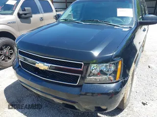 2011 Chevrolet Suburban LT with VIN 1GNSCJE09BR319675, listed as a IAAI auction lot 41966225 with 294,335 mi miles. Bid and sale history available at carsss.com. Image 6.