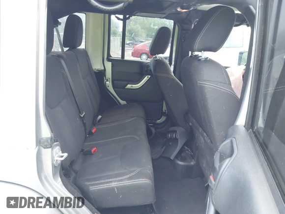 2016 Jeep Wrangler Unlimited Sahara with VIN 1C4BJWEG3GL240859, listed as a IAAI auction lot 42628937 with 103,378 mi miles and . Bid and sale history available at DreamBid. Image 8.