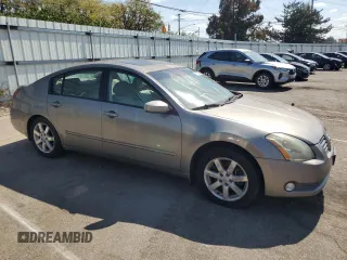 2004 Nissan Maxima SE with VIN 1N4BA41E14C852424, listed as a Copart auction lot 71232974 with 190,530 mi miles and Clean Title. Bid and sale history available at DreamBid. Image 4.
