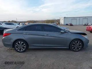 2014 Hyundai Sonata Limited with VIN 5NPEC4AB9EH897799, listed as a IAAI auction lot 40771774 with 221,000 mi miles and . Bid and sale history available at DreamBid. Image 12.