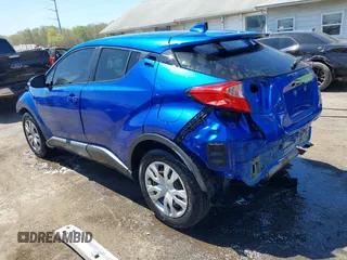 2020 Toyota C-HR LE with VIN JTNKHMBX7L1071287, listed as a IAAI auction lot 42063896 with 76,731 mi miles. Bid and sale history available at carsss.com. Image 3.