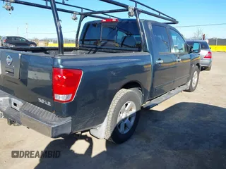 2004 Nissan Titan LE with VIN 1N6AA07A74N568235, listed as a IAAI auction lot 41713080 with 187,318 mi miles and . Bid and sale history available at DreamBid. Image 4.