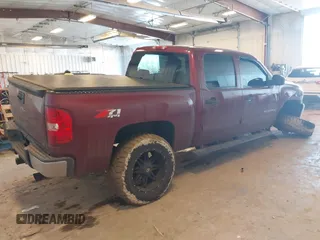 2013 Chevrolet Silverado 1500 LT with VIN 3GCPKSE77DG254204, listed as a IAAI auction lot 41680546 with 213,790 mi miles. Bid and sale history available at carsss.com. Image 4.