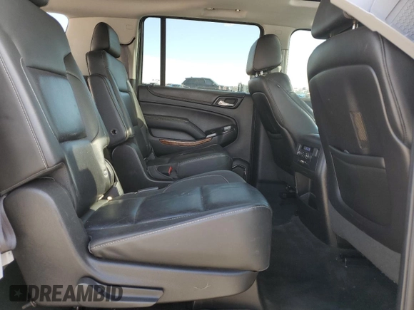2015 Chevrolet Suburban LTZ with VIN 1GNSKKKC1FR120164, listed as a Copart auction lot 53700455 with 195,815 mi miles and Salvage Title. Bid and sale history available at DreamBid. Image 11.