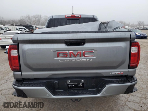 2023 GMC Canyon 4WD AT4 with VIN 1GTP6DEK1P1263245, listed as a Copart auction lot 83553294 with 0 mi miles and Salvage Title. Bid and sale history available at carsss.com. Image 6.