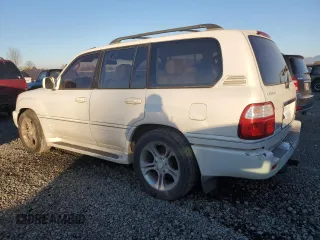 1999 Lexus LX 470 z VIN JT6HT00WXX0056382, wystawiony jako Copart lot #43045035 z przebiegiem 238 727 mil mil oraz Czysty tytuł • Clean title. Historia ofert i sprzedaży dostępna na DreamBid. Obrazek 2.