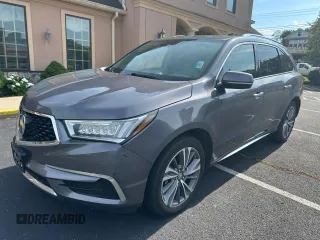 2018 Acura MDX Technology with VIN 5J8YD4H53JL020565, listed as a Copart auction lot 64906135 with 205,899 mi miles and Clean title. Bid and sale history available at DreamBid. Image 1.