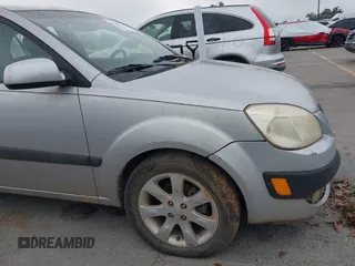 2007 Kia Rio LX with VIN KNADE123476286326, listed as a IAAI auction lot 42106275 with 183,042 mi miles. Bid and sale history available at carsss.com. Image 12.