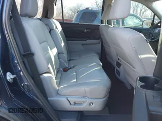 2017 Honda Pilot Touring with VIN 5FNYF6H99HB105446, listed as a IAAI auction lot 41283368 with 91,452 mi miles and . Bid and sale history available at DreamBid. Image 8.