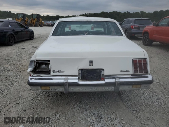 1987 Oldsmobile Cutlass z VIN 1G3GR51Y2HR316707, wystawiony jako Copart lot #69328344 z przebiegiem 70 828 mil mil oraz Szkody całkowita. Historia ofert i sprzedaży dostępna na DreamBid. Obrazek 6.