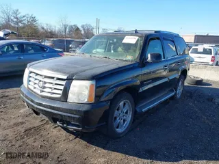 2006 Cadillac Escalade with VIN 1GYEK63NX6R110465, listed as a IAAI auction lot 41268338 with 202,042 mi miles. Bid and sale history available at carsss.com. Image 2.