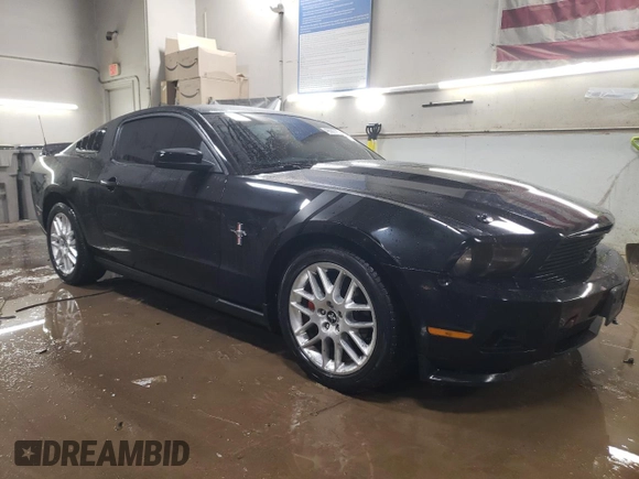 2012 Ford Mustang V6 Premium with VIN 1ZVBP8AM2C5221267, listed as a Copart auction lot 46583785 with 104,654 mi miles and Salvage Title. Bid and sale history available at carsss.com. Image 4.