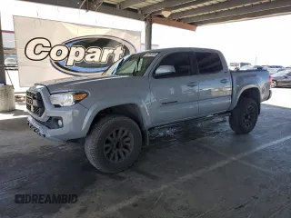 2020 Toyota Tacoma SR5 with VIN 3TMCZ5AN1LM347526, listed as a Copart auction lot 58261305 with 122,110 mi miles and Salvage title. Bid and sale history available at DreamBid. Image 1.